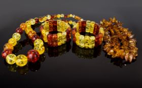 A Mixed Collection of Statement Necklaces And Bracelets to include faux amber graduating bead