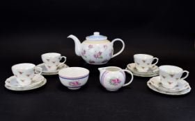 Pretty Floral Tea Set, comprising teapot, 4 cups,