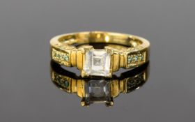 9ct Emerald Set Ring An unusual ring in neoclassical design with central clear crystal faceted