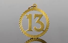A 9ct Gold Pendant with The Number 13 Within a Circle. Fully Hallmarked for The 1970's. 2.2 grams.