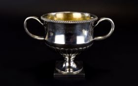 A Solid Silver Twin Handle Trophy Cup with Inscription Shioya Country Club,