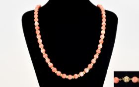 A Top Quality and Impressive 18ct Gold and Coral Beads Necklace with 18ct Gold Clasp and Spacers.