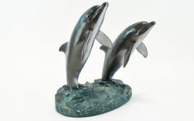 Robert Wyland - Impressive Painted Bronze Sculpture of a Pair of Dolphins.