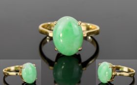 14ct Gold Set Single Stone Opal Dress Ring. The Large Oval Shaped Opal of Good Colour.