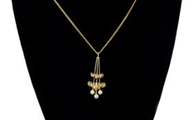 Retro - Looking 9ct Gold Pearl Set Pendant Drop, Attached to a Long 9ct Gold Curb Chain. c.1970's.