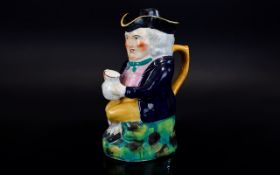 18th Century Staffordshire Hand Painted Toby Jug.