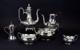 A Collection Of Late 19th And Early 20th Century EPNS Tea And Coffee Ware Six items in total, each