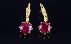 Ruby Solitaire Lever Back Drop Earrings, each round cut solitaire ruby being 2.