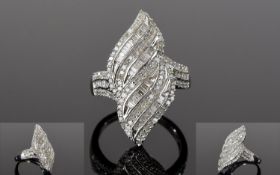 Diamond Wave Ring, round and baguette cut diamonds totalling 1ct,