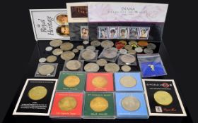 A Collection Of Mixed Commemorative Coins First Day Covers And Pin Badges A varied collection to