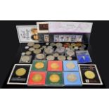 A Collection Of Mixed Commemorative Coins First Day Covers And Pin Badges A varied collection to
