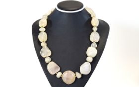 A Vintage Blush Quartz Necklace Collar style necklace comprising several natural blush quartz