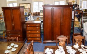 Stag Mahogany Finished Bedroom Suite comprising 3 door and 2 door wardrobes, chest of 4 drawers,