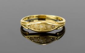 Antique Gold And Pearl Set Ring Attractive ring with small central oval set with three seed pearls