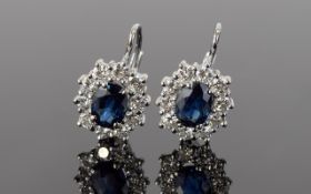 18ct White Gold Set Pair of Sapphire and Diamond Cluster Earrings, Flower head Setting, Marked 18ct.