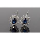 18ct White Gold Set Pair of Sapphire and Diamond Cluster Earrings, Flower head Setting, Marked 18ct.