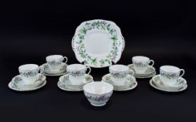 Mayfair China Part Teaset comprising 6 cups, saucers and side plates and a sandwich/cake plate.