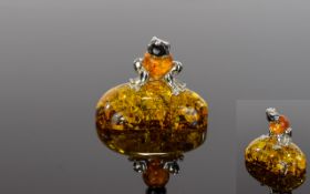 Amber and Silver Small Frog on Rock,