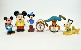 Collection of Walt Disney Collectables. Includes Mickey Mouse Alarm Clock, Pluto Nodding Figure,