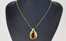 A Contemporary 9ct Gold - Golden Topaz Set Pendant with Attached 18ct Gold Plated Long Chain.