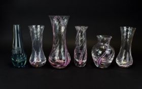 A Collection Of Decorative Glass Vases Six in total each in rose and amethyst tones, to include