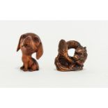 Contemporary Carved Netsuke Two in total, fashioned in dark wood the first in the form of a coiled