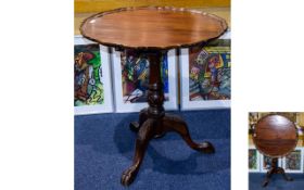 A Georgian Style Tilt Top Table with bird cage mechanism.