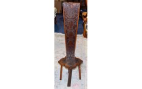 Arts and Crafts Spinning Chair with carved Floral decoration. dated 1899.