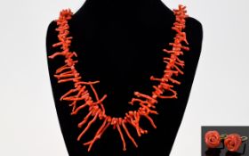A Vintage Coral Necklace And Earrings Long natural coral 1950's necklace with graduated coral