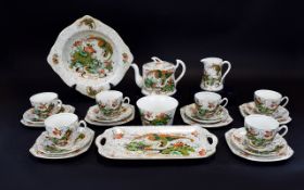 Phoenix Ware Oriental Style Teaset with Chinese Dragon and Garden Decoration.