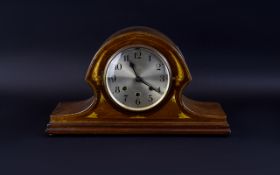 Westminster Dome Shaped Mantle Clock with silvered dial and Arabic numerals.