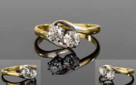 18ct Gold and Platinum Set Diamond Two Stone Twist Dress Ring.