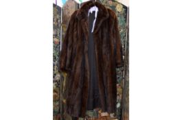Full Length Dark Brown Mink Coat with side seam pockets, hook and eye closure,