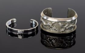 Silver African Inspired Cuff And Silver Tone Statement Cuff Two items in total,