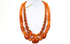 Vintage Amber Coloured Graduated Beaded Necklace ( 3 ) Lengths 26 & 24 Inches.