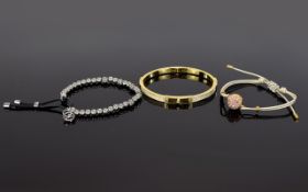 3 Designer Bracelets To include rose gold tone and crystal set friendship bracelet,