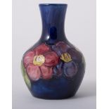 Walter Moorcroft, 'Clematis' a vase, circa 1950, bottle form, applied paper label,