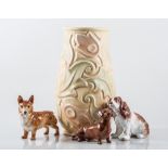 Collection of Sylvac and other dog models, together with a Wade vase.