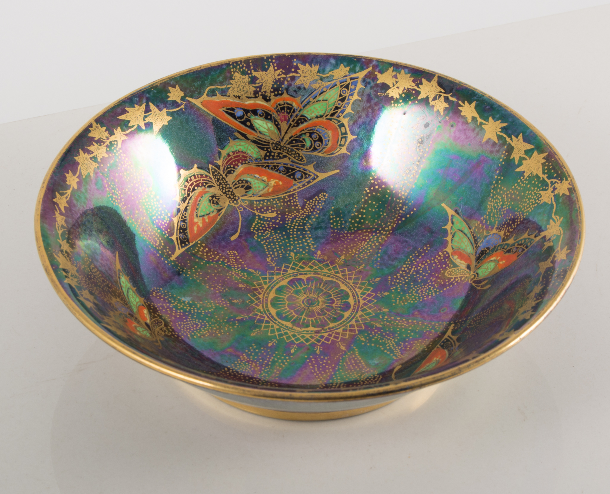 Small Crown Devon rural lustrine pottery bowl, decorated with butterflies, 14cm.