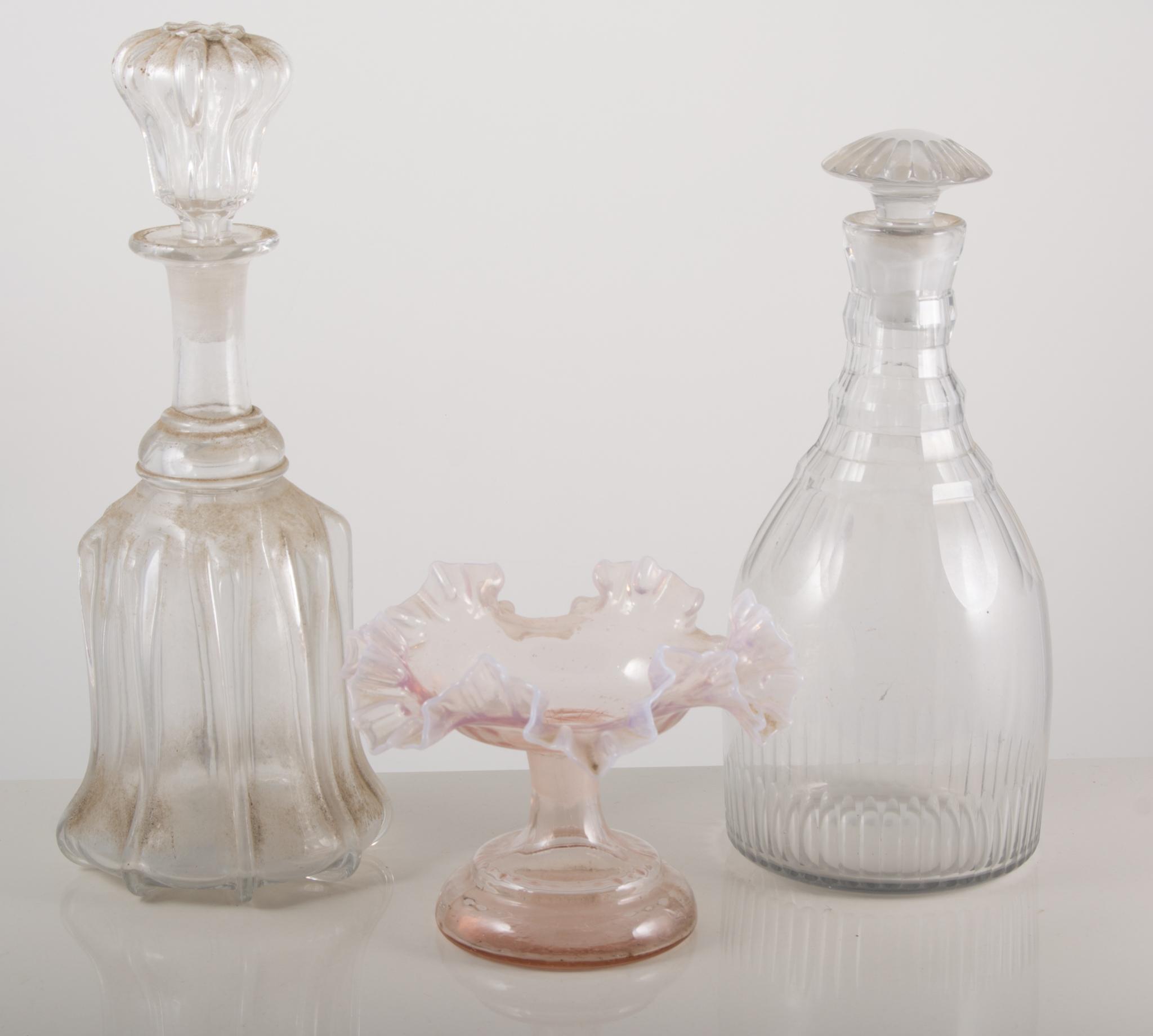 Three Victorian decanters and three Royal commemorative glass plates,