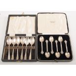 Two sets of silver coffee spoons, cased; and a set of plated fish knives and forks,