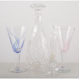 Box of drinking glasses, some cut glass, including two decanters with stoppers, and other glass.