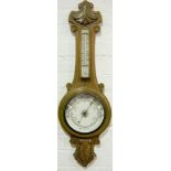 Carved cased aneroid barometer and thermometer, 90cm.