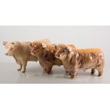 Beswick figures, two "Highland" bulls no.2008, 12cm tall, and another bull, all with damages, (3).