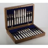 Set of six silver bladed fish knives and forks, Sheffield 'd', in an oak fitted box,
