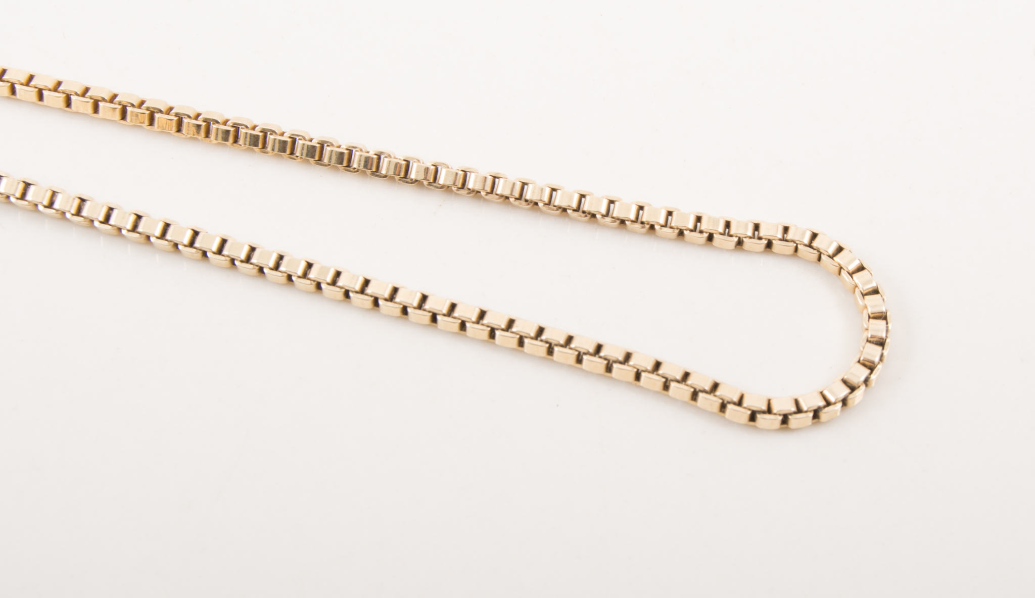 A 9 carat yellow gold 2.6m gauge box link chain, 40 cms long, approximate weight 16gms.