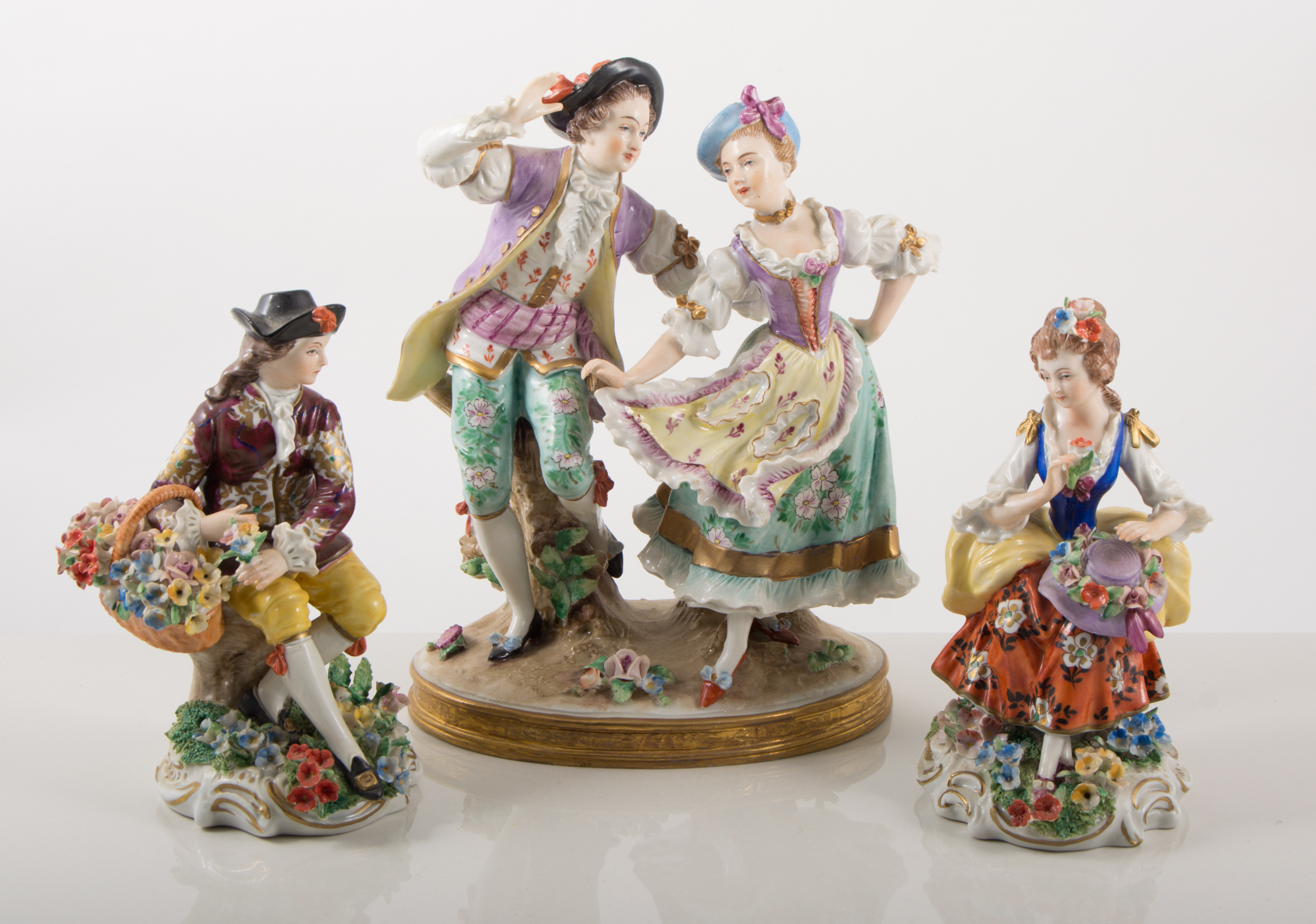 Sitzendorf group, gentleman and lady dancing, 20cm, together with two other Sitzendorf figures,