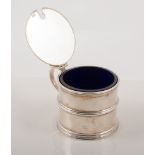 A silver drum mustard, plain polished design with ribbed waistband and base, flat cover,