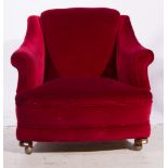 Edwardian elbow chair, red dralon upholstery, plain beechwood bun feet, width 78cm.