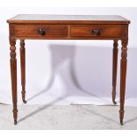 A Regency mahogany writing table, rectangular top with tooled leather inset,